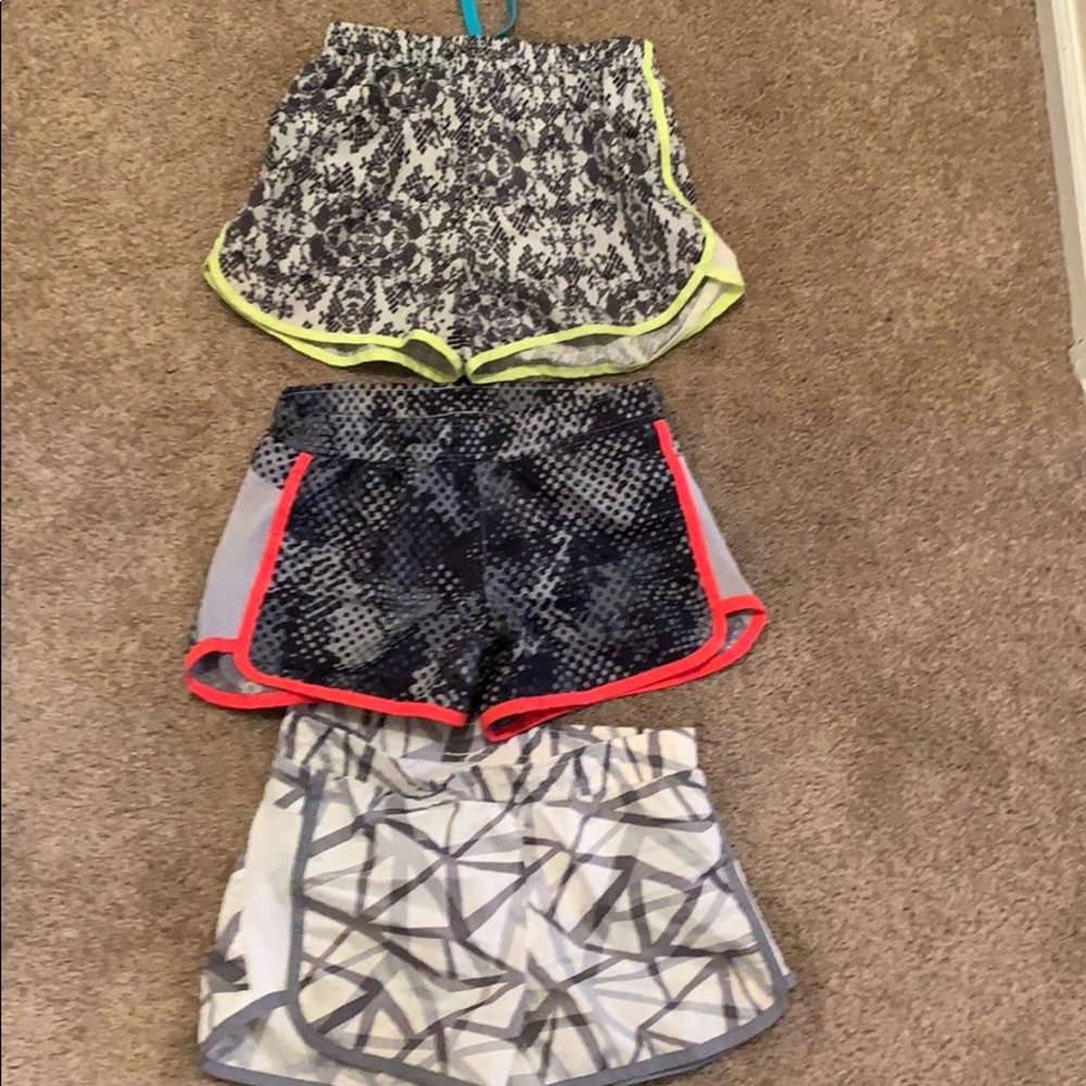 Girls size 8 lot of soccer/running shorts
